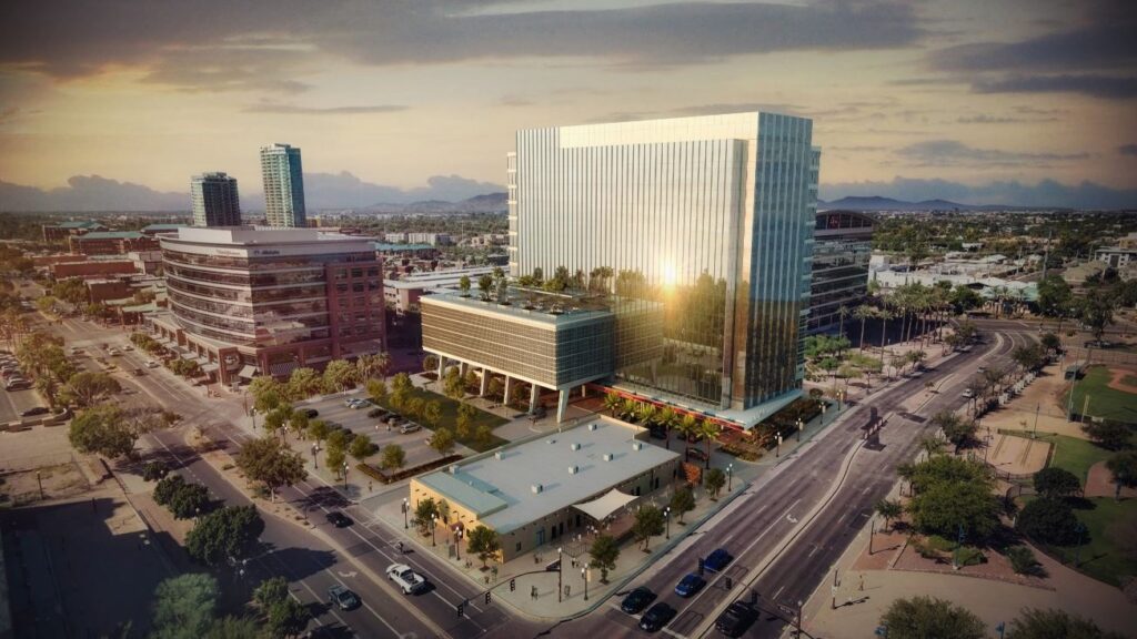 Photo of downtown city. Including many large buildings and Photo courtesy of www.downtowntempe.com and www.cbre.us.