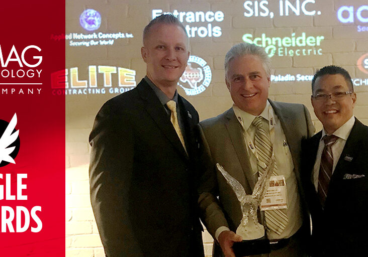 AMAG Technology, Senior Director of Global Sales, Justin Wilmas and President, Kurt Takahashi (right) congratulate OHM Security President/Manager, Maurice Daoust (middle) on his Eagle Award for Eastern Canada.