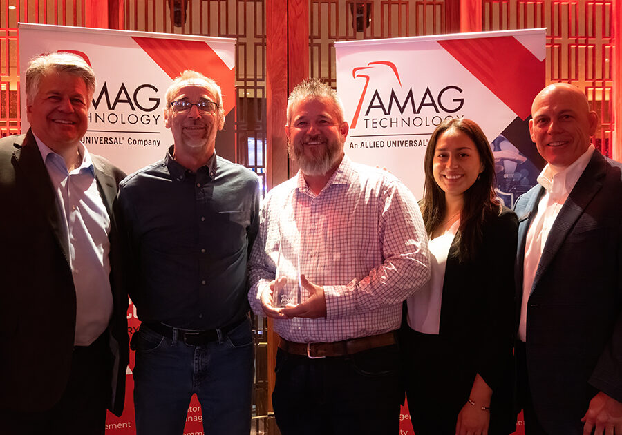 Photo of five people smiling as AMAG Technology Celebrates Top Performing Resellers