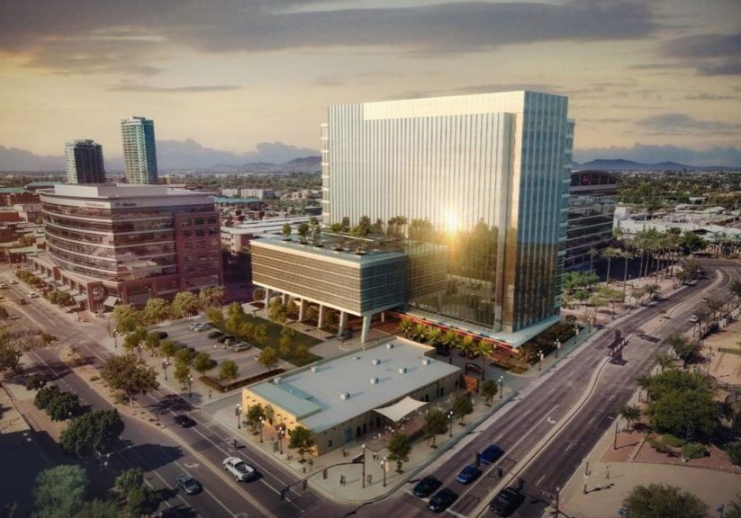 Photo of downtown city. Including many large buildings and Photo courtesy of www.downtowntempe.com and www.cbre.us.